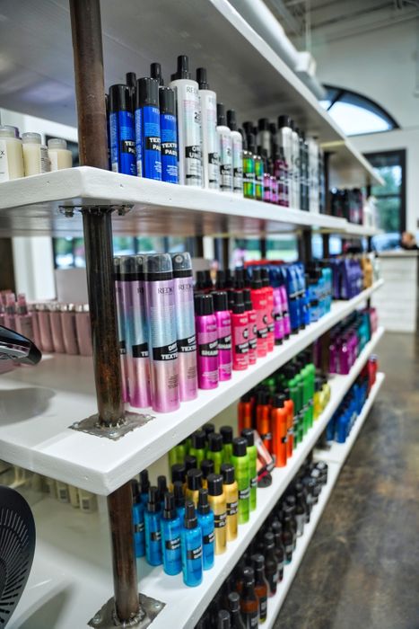 Shelves filled with various sprays